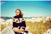 [Picture of Patrick sitting on a rock at
Mono Lake, CA]